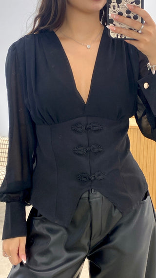 BLUSA NUDOS