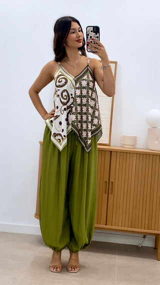 TOP ASIMÉTRICO ESTAMPADO Y TIRANTES