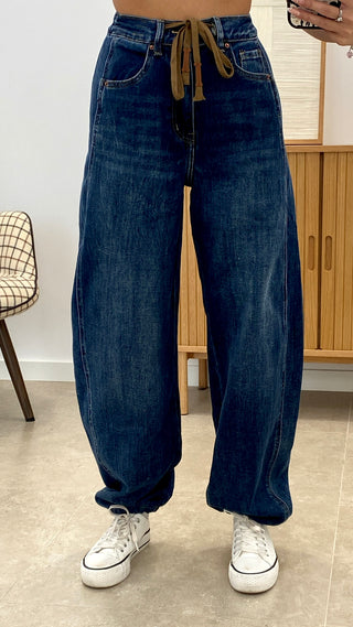 PANTALÓN VAQUERO CON CORDÓN DE ANTE