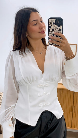BLUSA NUDOS
